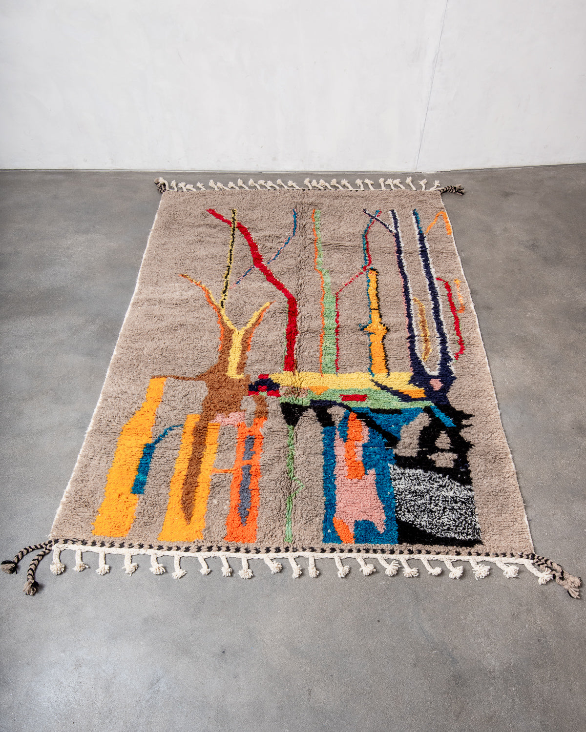 Modern, designer, handcrafted Berber rug from Morocco. Beniourain carpet with beautiful colours and patterns and fluffy wool texture.